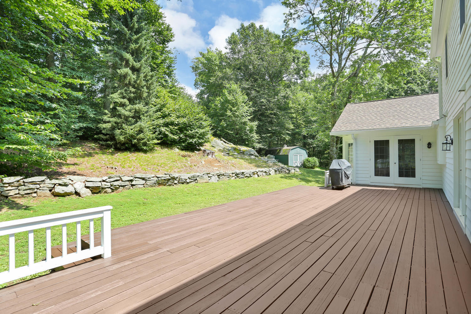 171 Jonathan Road New Canaan, CT 06840 - Photo 34 of 38 a view of a house with a yard