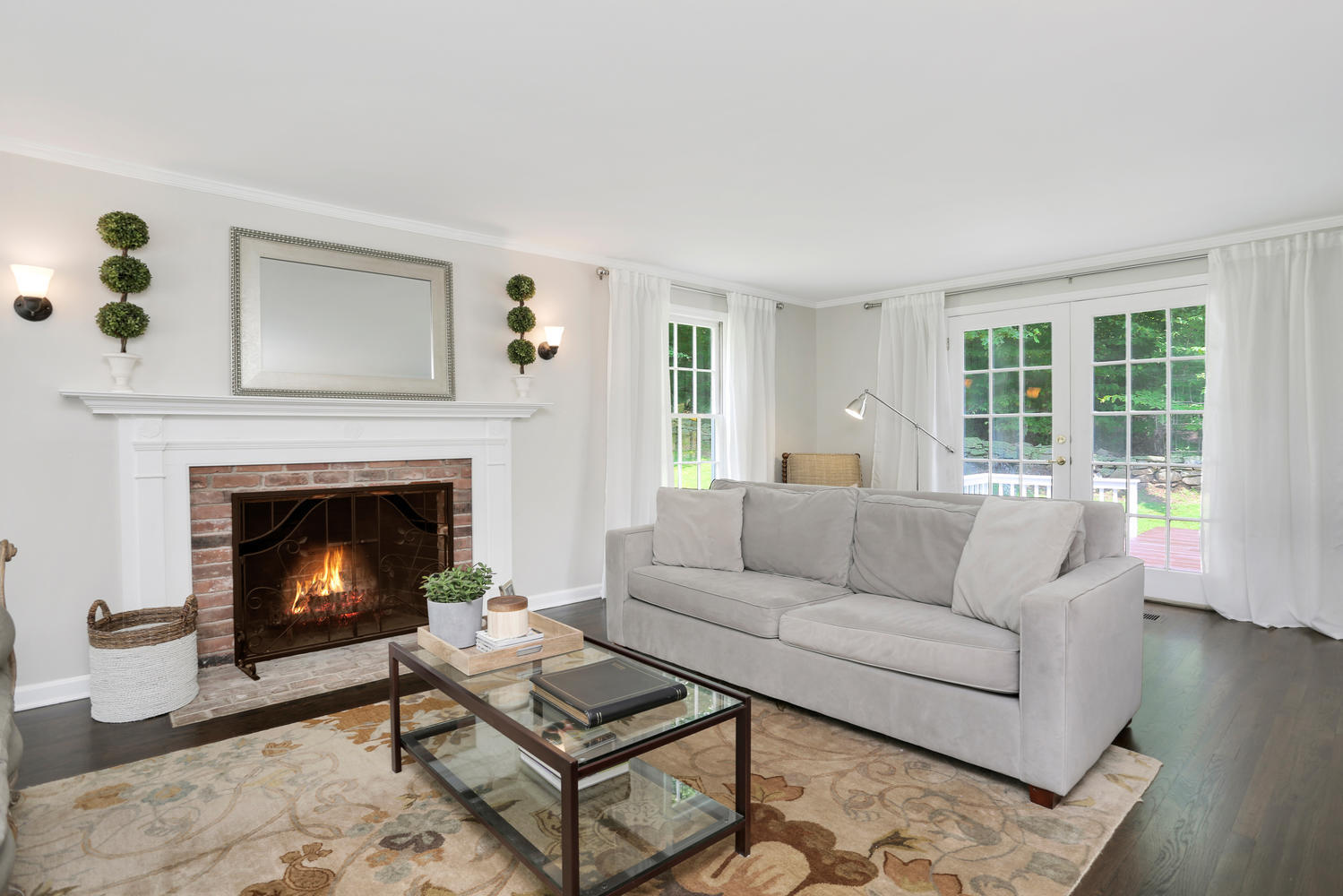 171 Jonathan Road New Canaan, CT 06840 - Photo 5 of 38 a living room with furniture and a fireplace