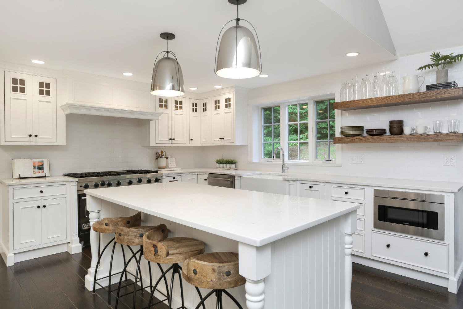 171 Jonathan Road New Canaan, CT 06840 - Photo 9 of 38 a kitchen with a stove a sink and a refrigerator