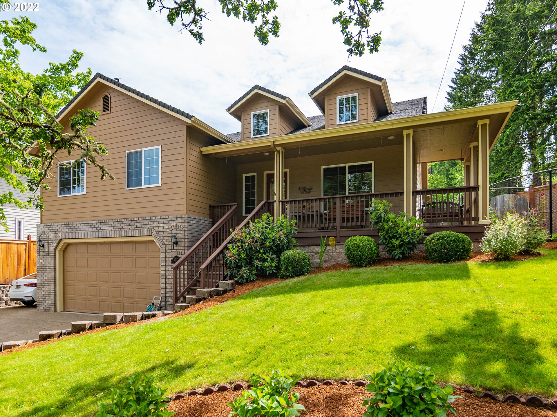 2255 33rd Street Springfield, OR 97477 - Photo 1 of 31 a front view of a house with yard and green space