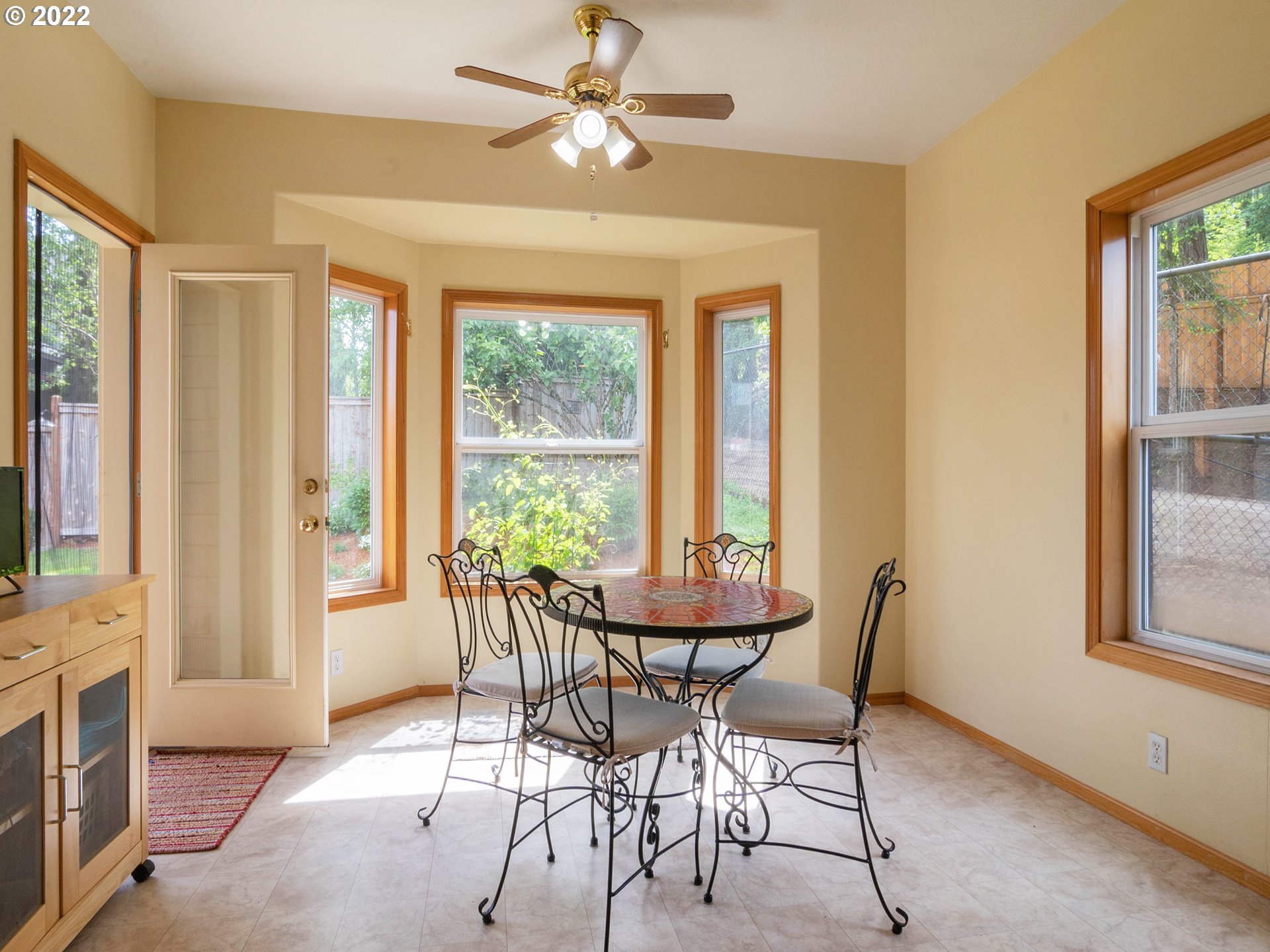 2255 33rd Street Springfield, OR 97477 - Photo 14 of 31 a dining room with furniture a chandelier and a rug