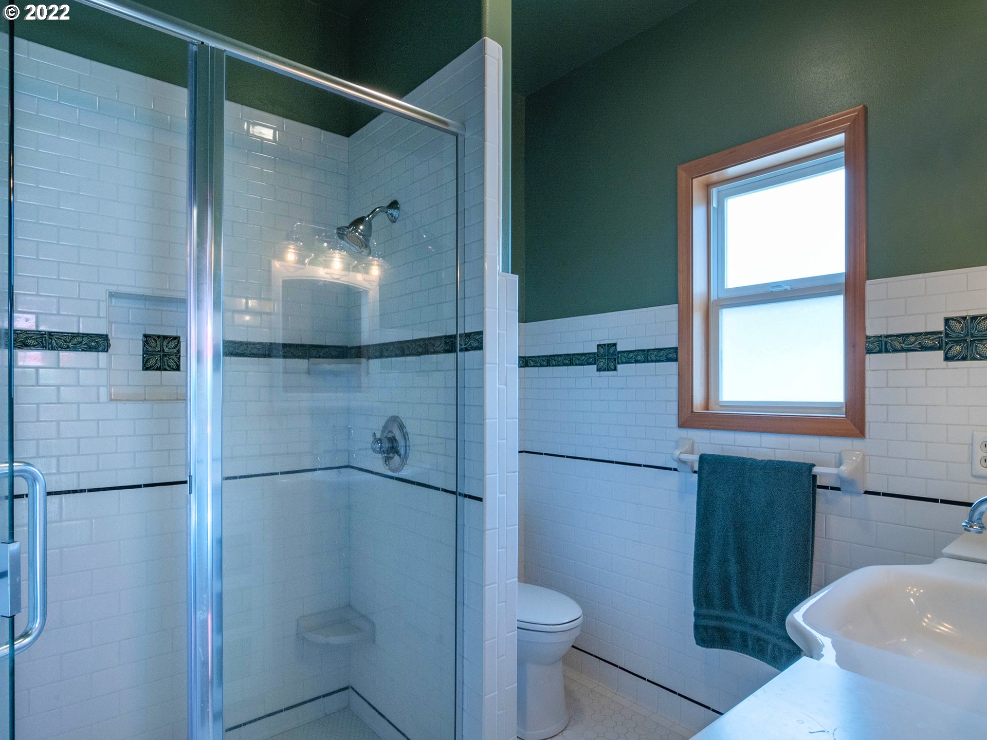2255 33rd Street Springfield, OR 97477 - Photo 15 of 31 a bathroom with a granite countertop shower a toilet and sink