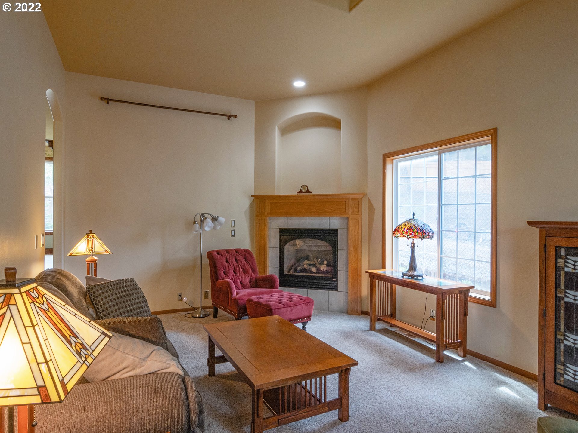 2255 33rd Street Springfield, OR 97477 - Photo 5 of 31 a living room with furniture and a fireplace
