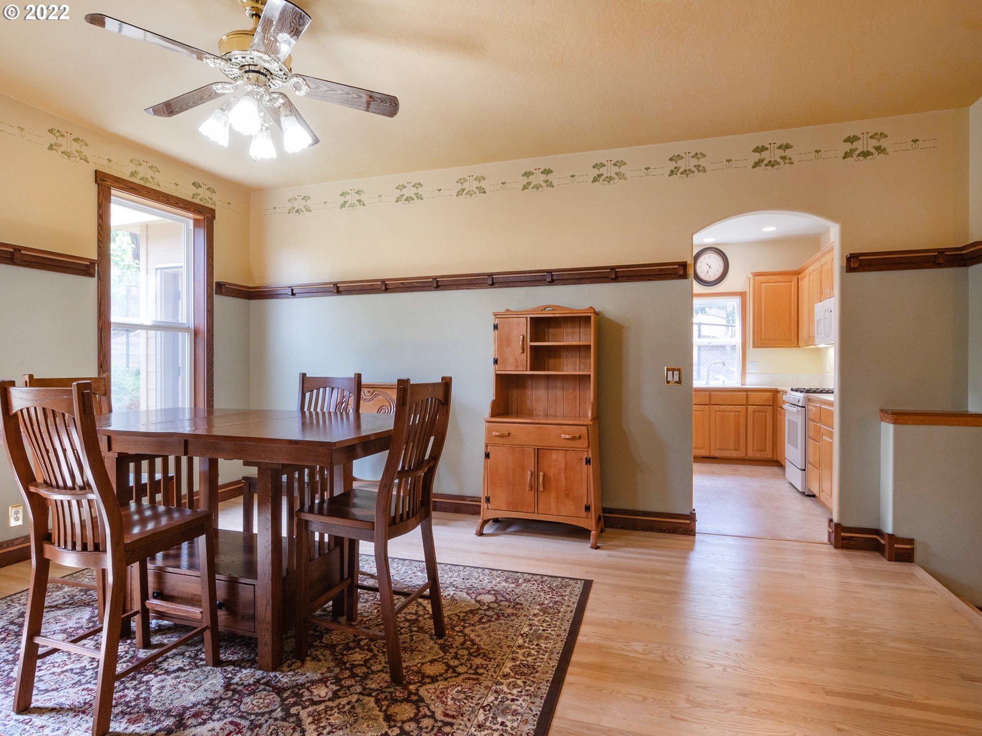 2255 33rd Street Springfield, OR 97477 - Photo 7 of 31 a view of a dining room with furniture and wooden floor