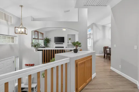 a kitchen with stainless steel appliances granite countertop a stove and a sink