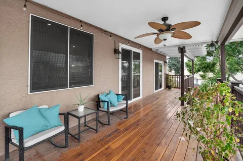 a view of a livingroom with furniture and a yard