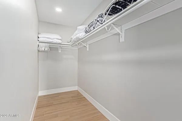 a view of a room with racks on the wall