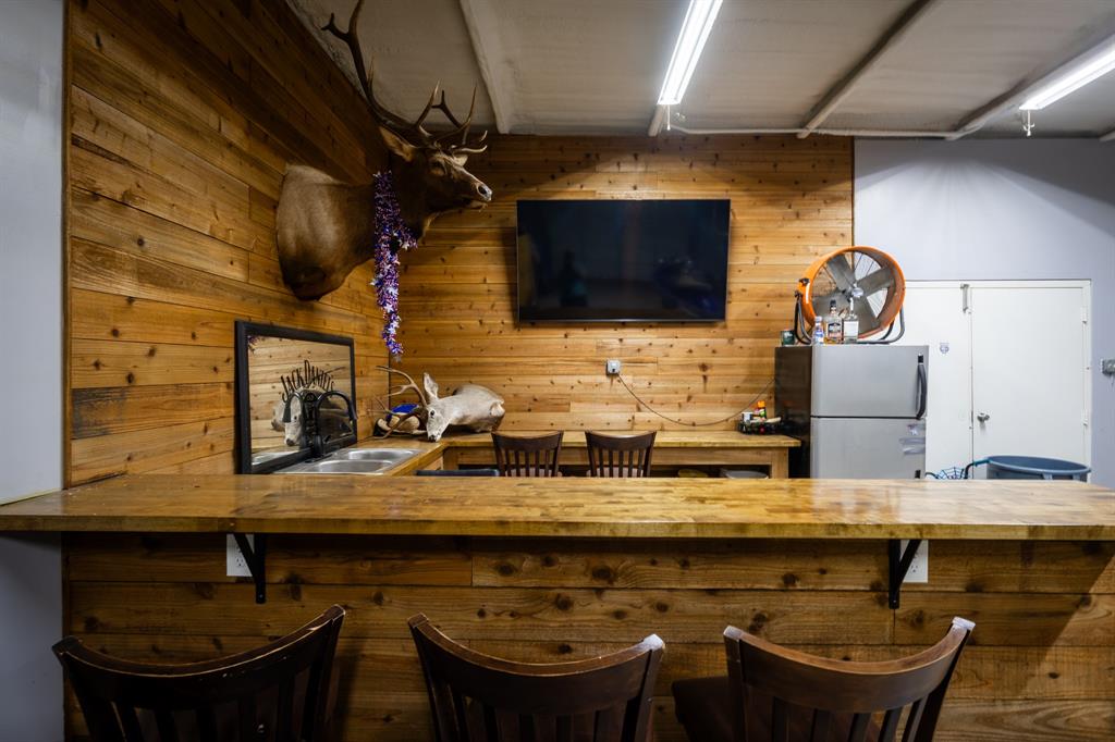 4705 Fox Hollow Road, Unit 30 Graham, TX 76450 - Photo 18 of 31 a bathroom with a sink and a mirror