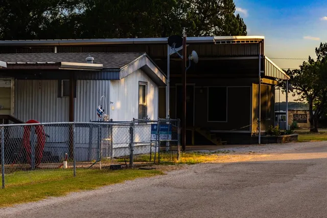 a view of swimming pool with patio