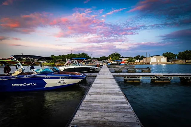 a view of a lake with boats