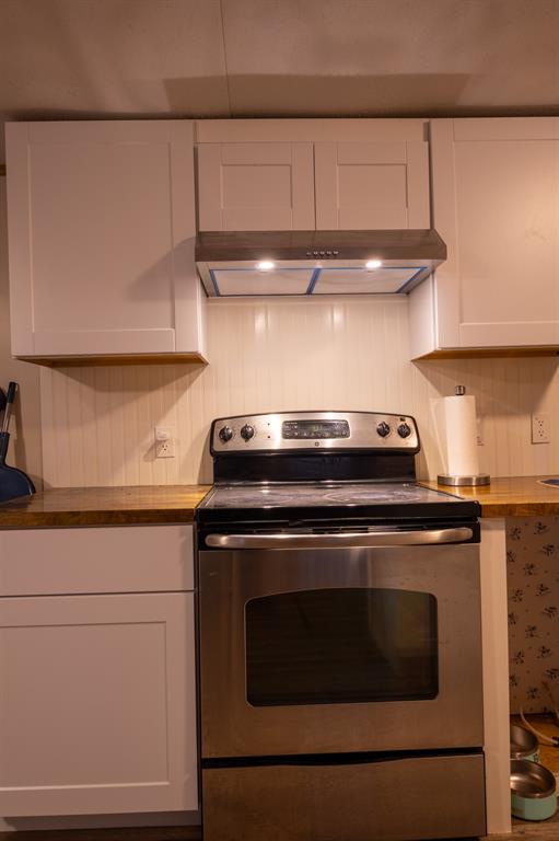 4705 Fox Hollow Road, Unit 30 Graham, TX 76450 - Photo 7 of 31 a stove top oven sitting inside of a kitchen