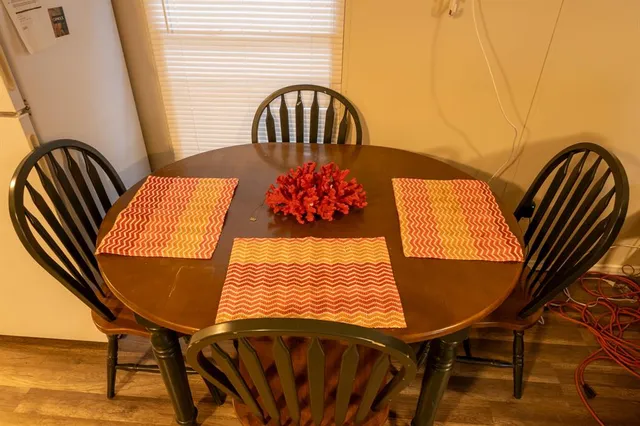 a view of balcony with furniture