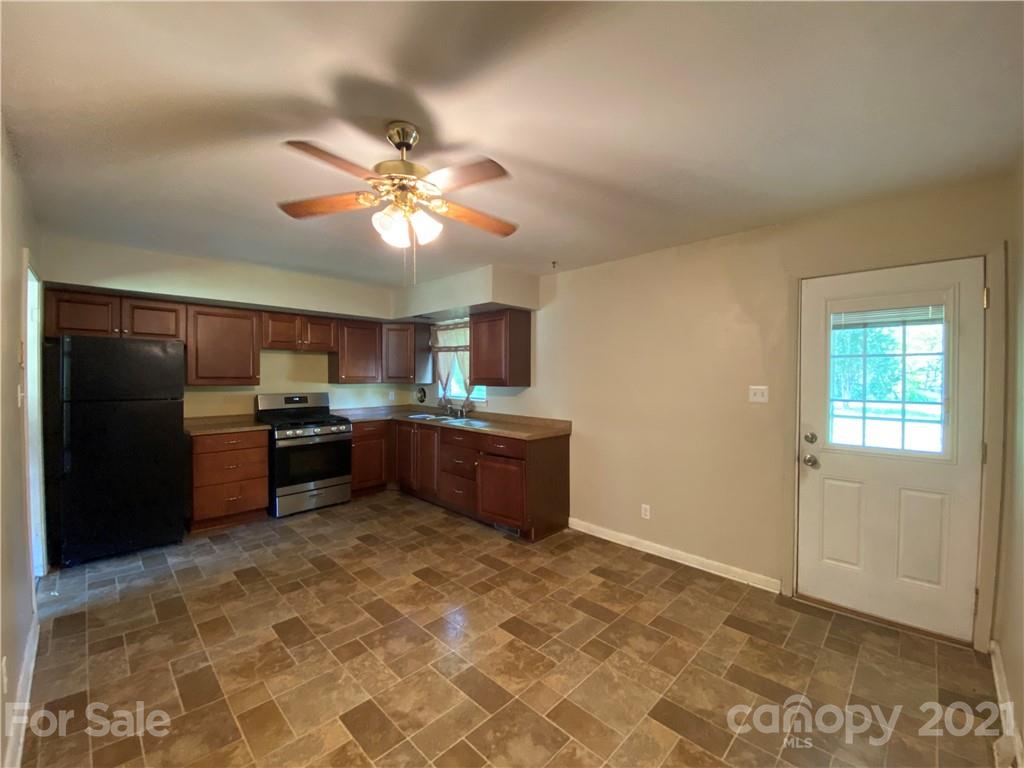612 Jennings Road Rock Hill, SC 29730 - Photo 15 of 27 a kitchen with stainless steel appliances granite countertop a refrigerator and a stove top oven