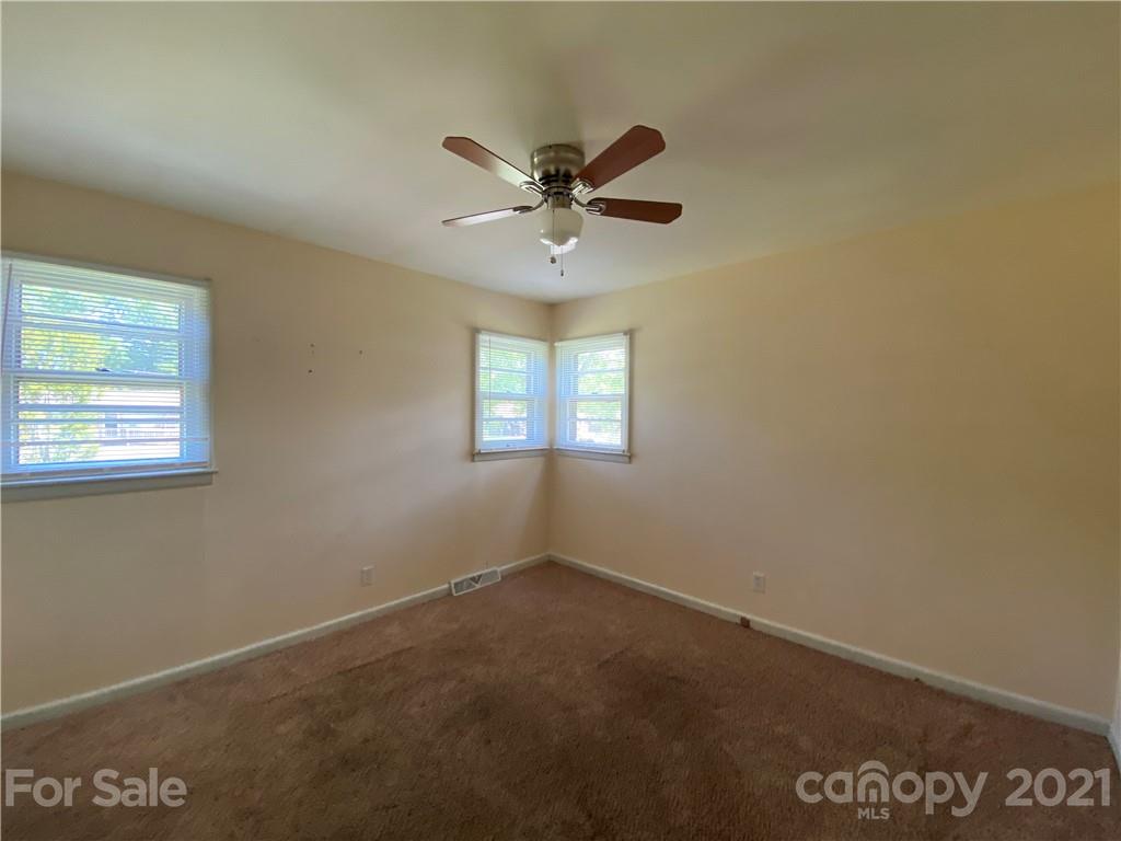 612 Jennings Road Rock Hill, SC 29730 - Photo 23 of 27 an empty room with windows and fan