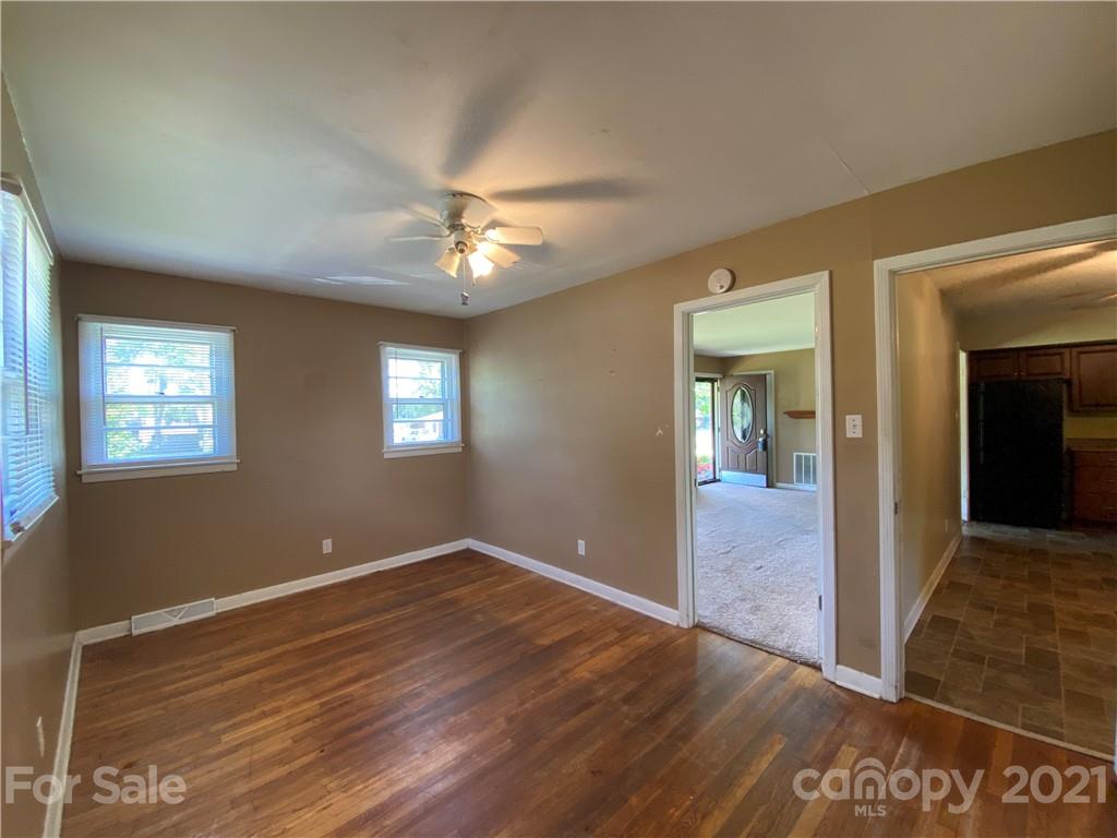 612 Jennings Road Rock Hill, SC 29730 - Photo 10 of 27 a view of an empty room with window and wooden floor