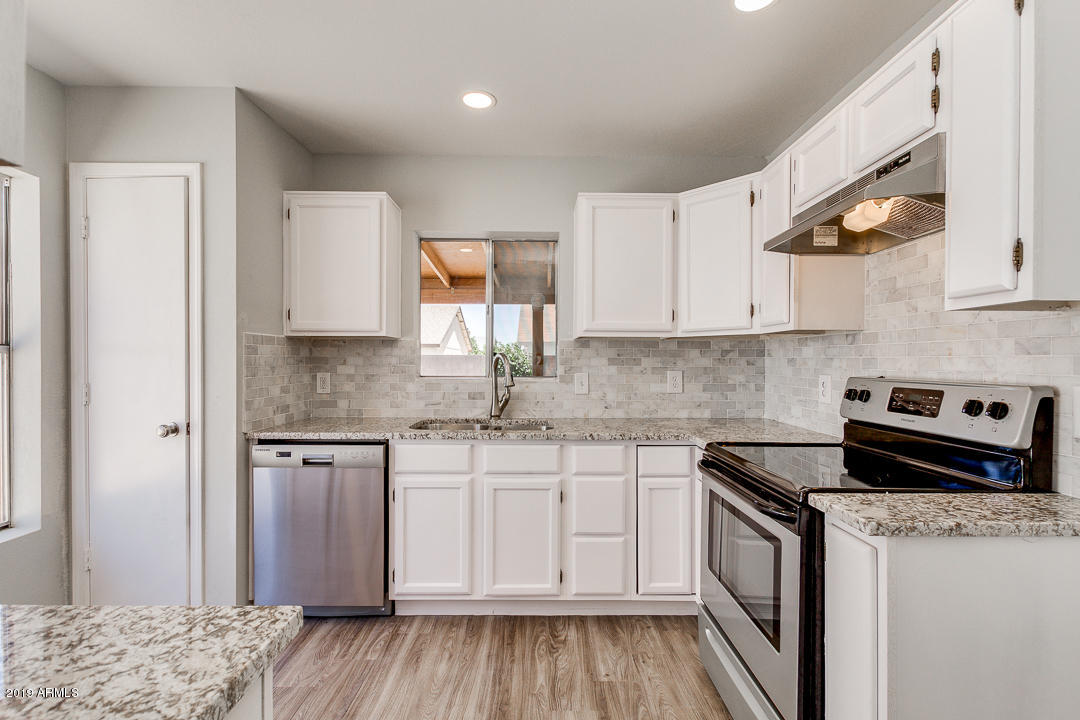 6149 Casper Road Mesa, AZ 85205 - Photo 7 of 21 New granite & tile backsplash
