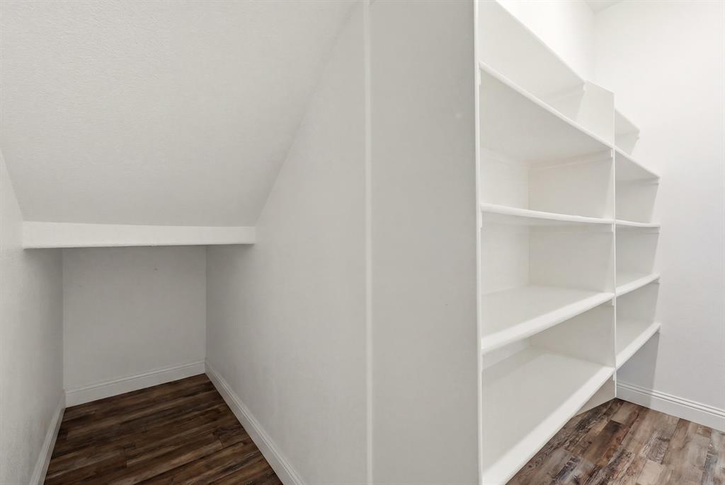 1313 Kirkwood Road Rockwall, TX 75087 - Photo 17 of 39 Under stairs storage in HUGE pantry!