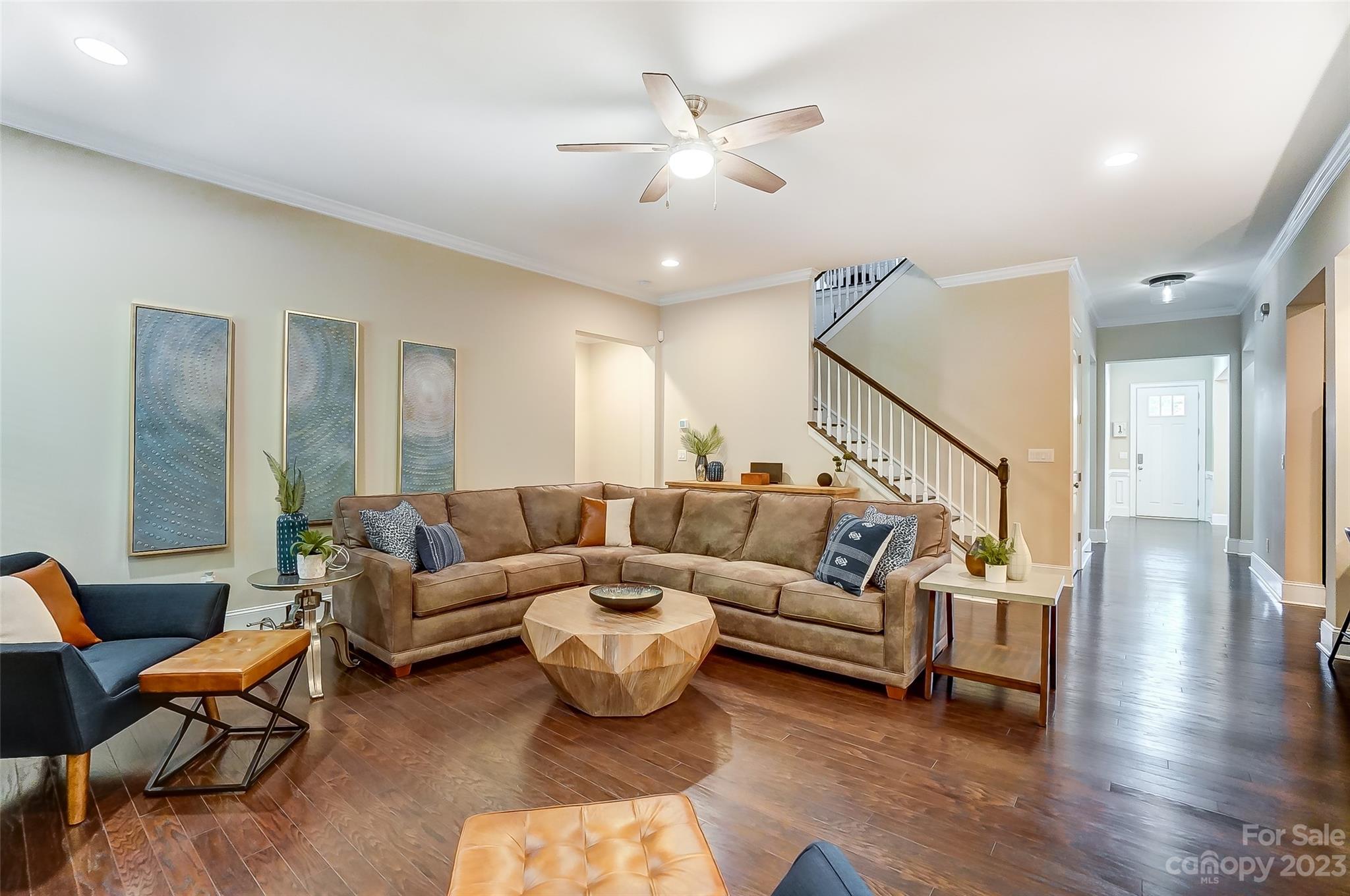 1494 Afton Way Fort Mill, SC 29708 - Photo 19 of 47 a living room with furniture or wooden floor and a chandelier