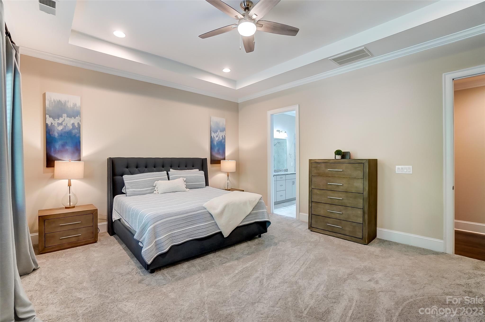 1494 Afton Way Fort Mill, SC 29708 - Photo 22 of 47 a spacious bedroom with a bed and ceiling fan