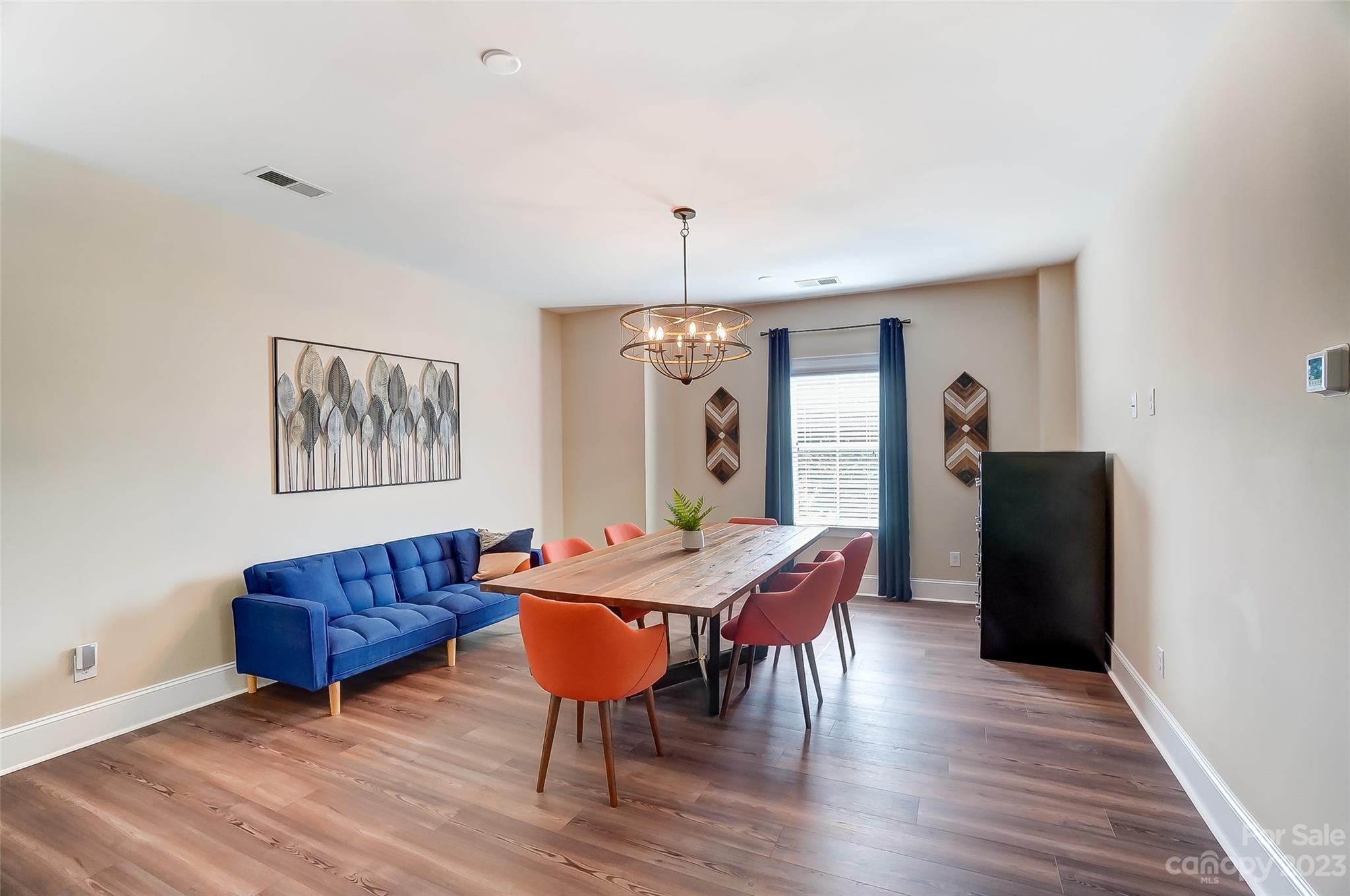 1494 Afton Way Fort Mill, SC 29708 - Photo 24 of 47 a view of a dining room with furniture window and wooden floor
