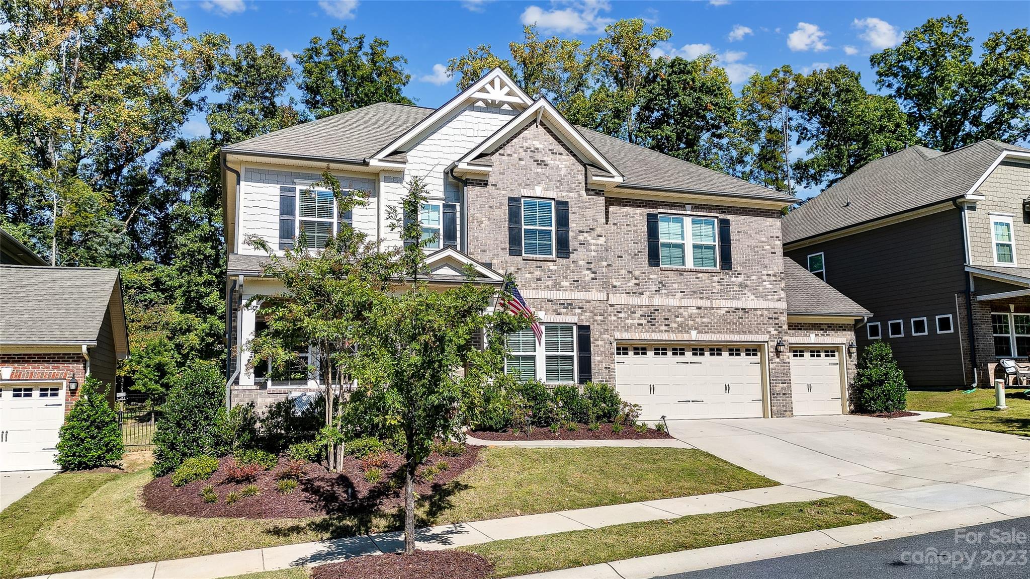 1494 Afton Way Fort Mill, SC 29708 - Photo 3 of 47 a front view of a house with a yard and garage