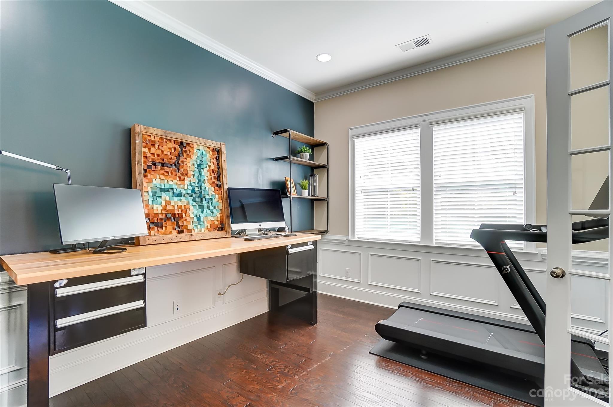 1494 Afton Way Fort Mill, SC 29708 - Photo 9 of 47 a view of a room with gym equipment and wooden floor