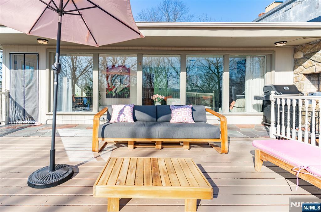 21 Skyview Road Ringwood, NJ 07456 - Photo 17 of 49 a living room with furniture and a large window