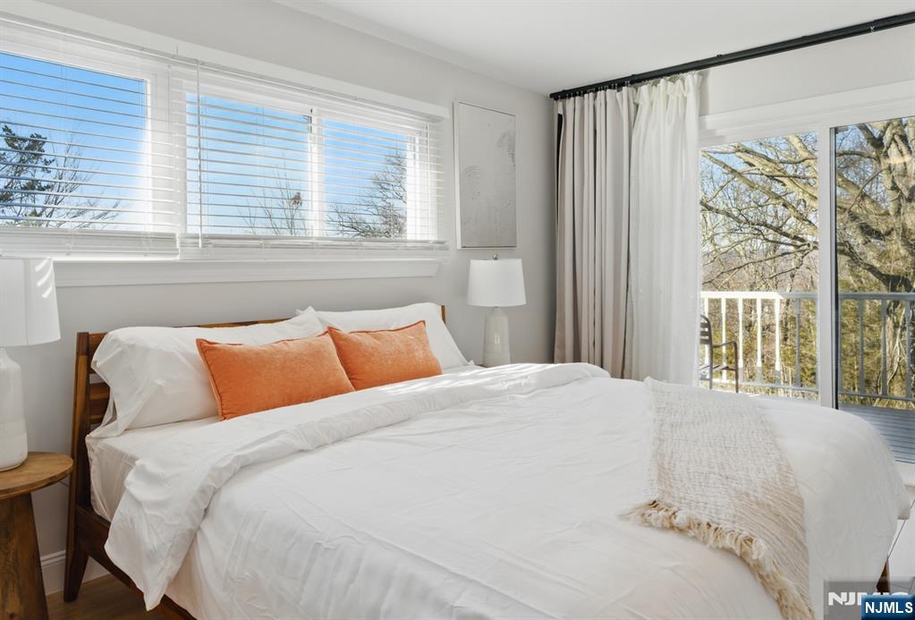 21 Skyview Road Ringwood, NJ 07456 - Photo 33 of 49 a bedroom with a large bed and a window