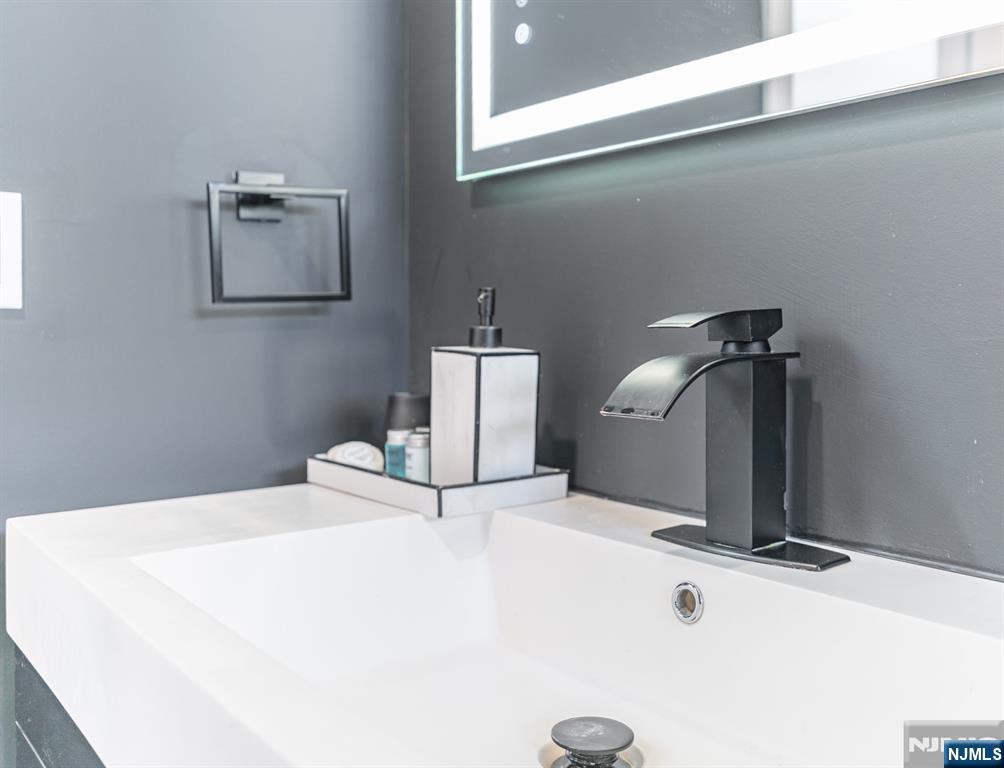 21 Skyview Road Ringwood, NJ 07456 - Photo 6 of 49 a bathroom with a sink