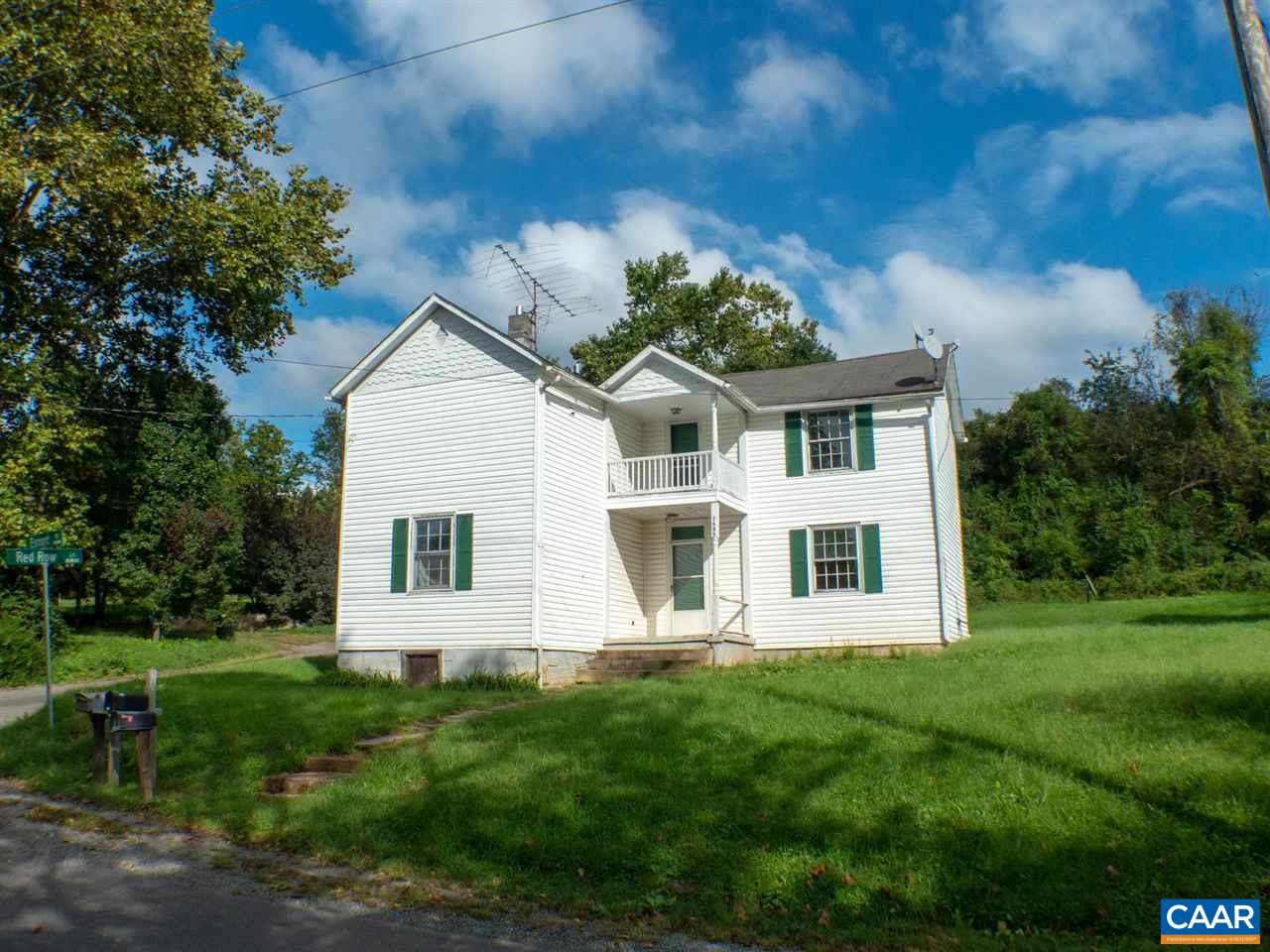 7595 Esmont Road Esmont, VA 22937 - Photo 1 of 30 a front view of a house with a yard