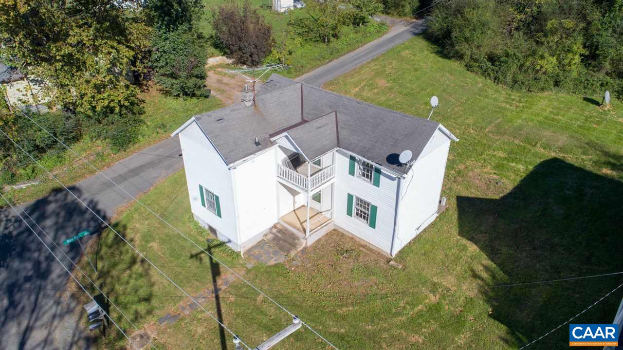 7595 Esmont Road Esmont, VA 22937 - Photo 2 of 30 a view of a house with a yard