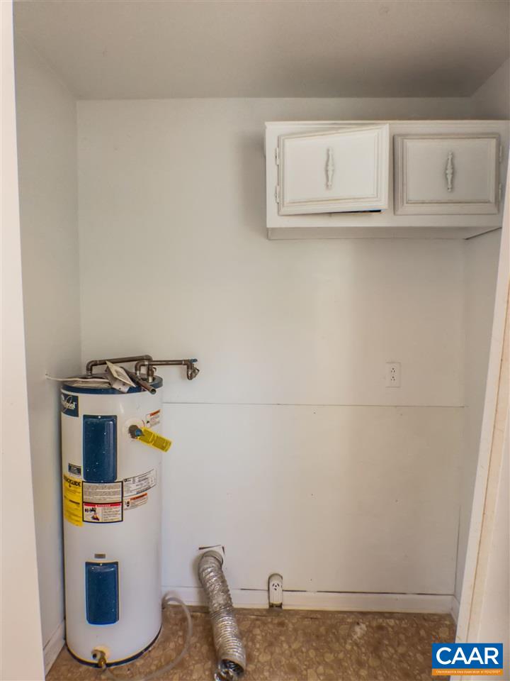 7595 Esmont Road Esmont, VA 22937 - Photo 22 of 30 a bathroom with a sink and washing machine