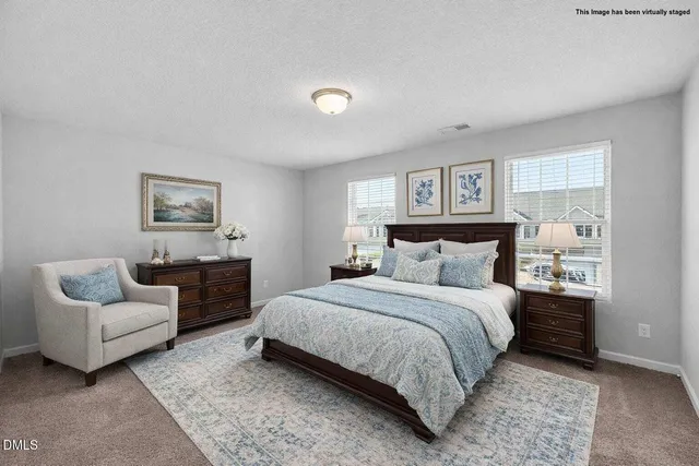 a house with swimming pool in front of it