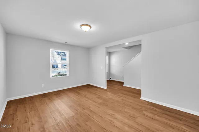 a kitchen with a sink and a stove top oven