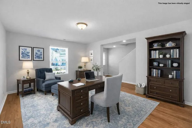 a spacious bedroom with a bed and couch