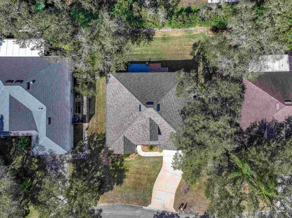an aerial view of beach and city