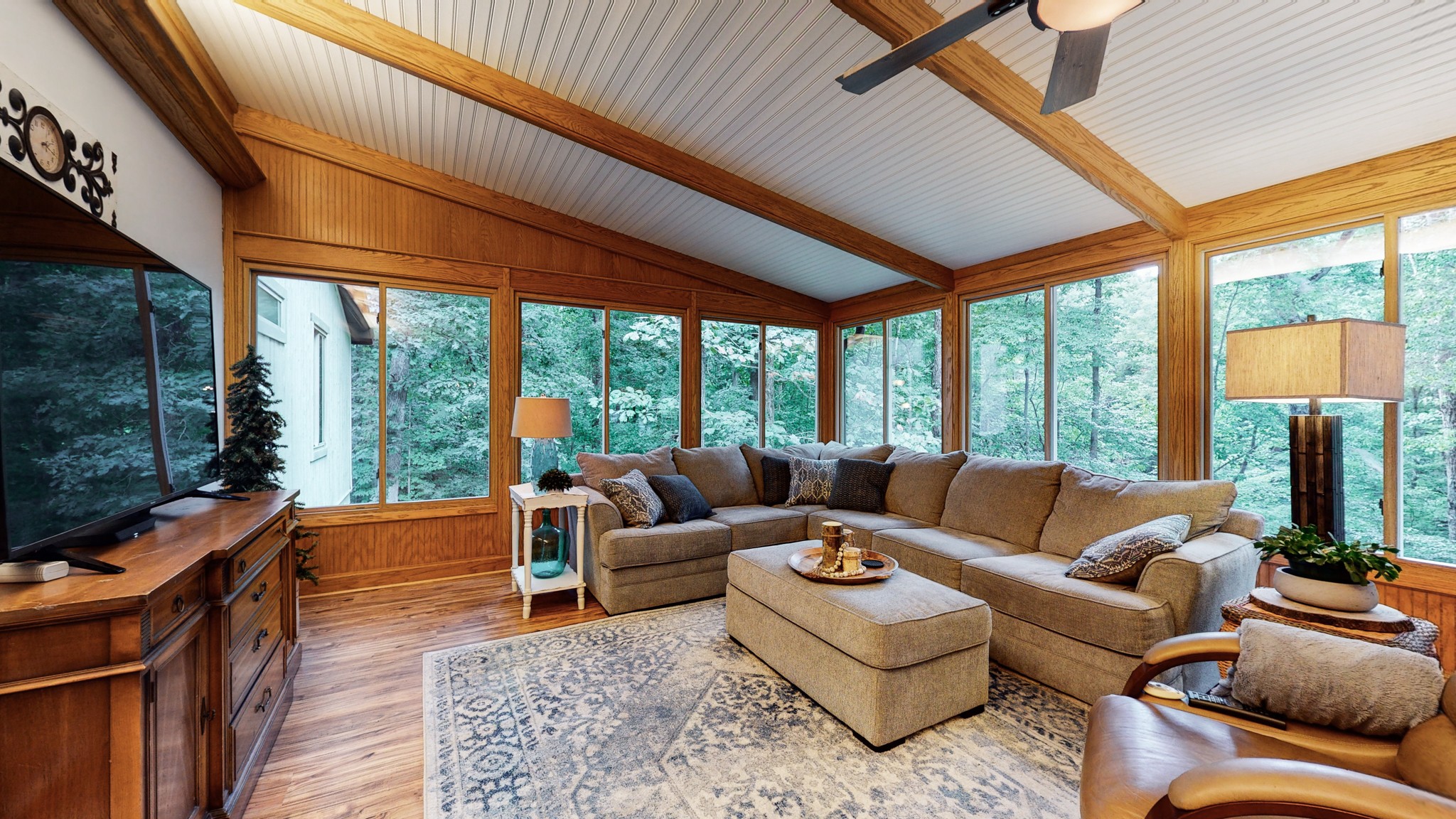 7449 Les Hughes Road Fairview, TN 37062 - Photo 18 of 49 a living room with furniture floor to ceiling window and floor to ceiling window