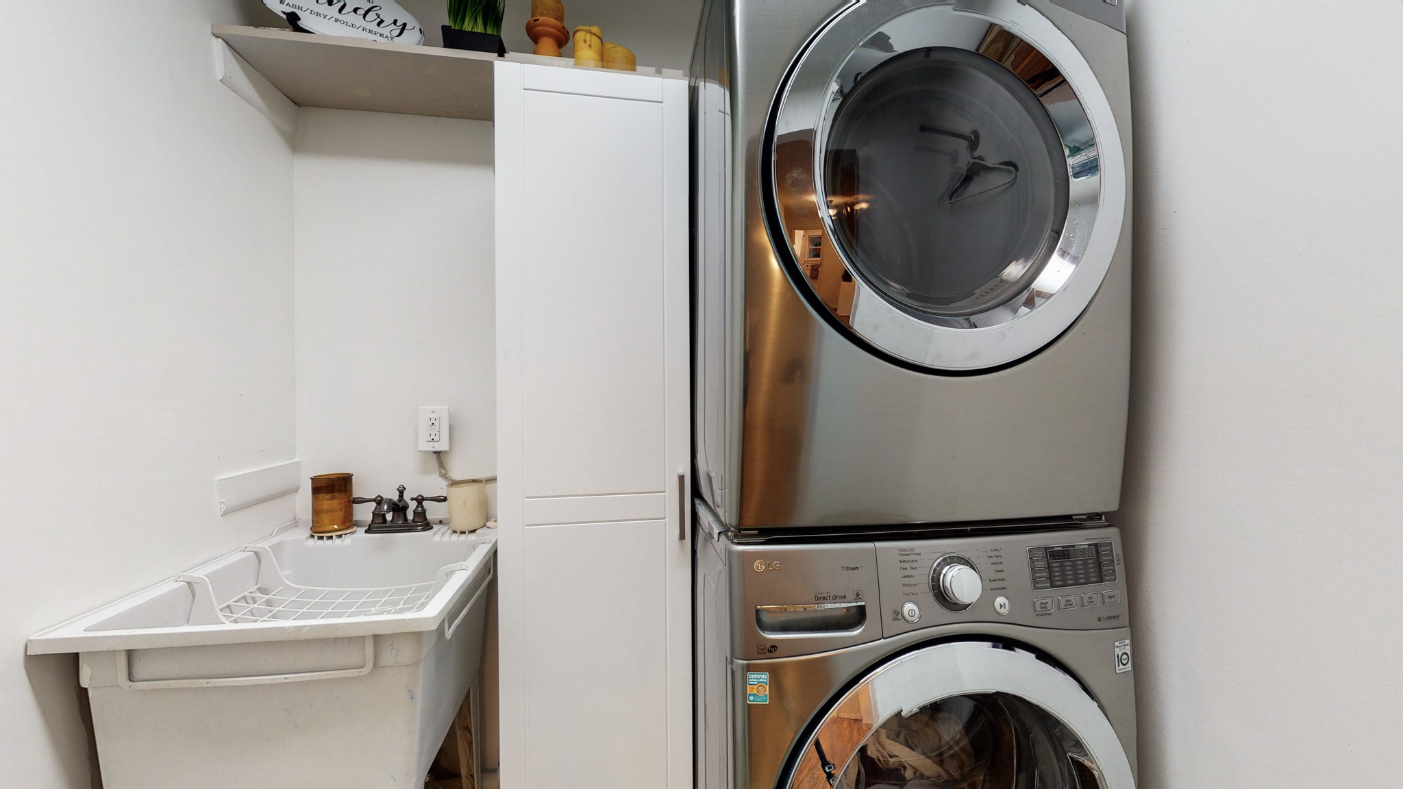 7449 Les Hughes Road Fairview, TN 37062 - Photo 20 of 49 a utility room with dryer and washer