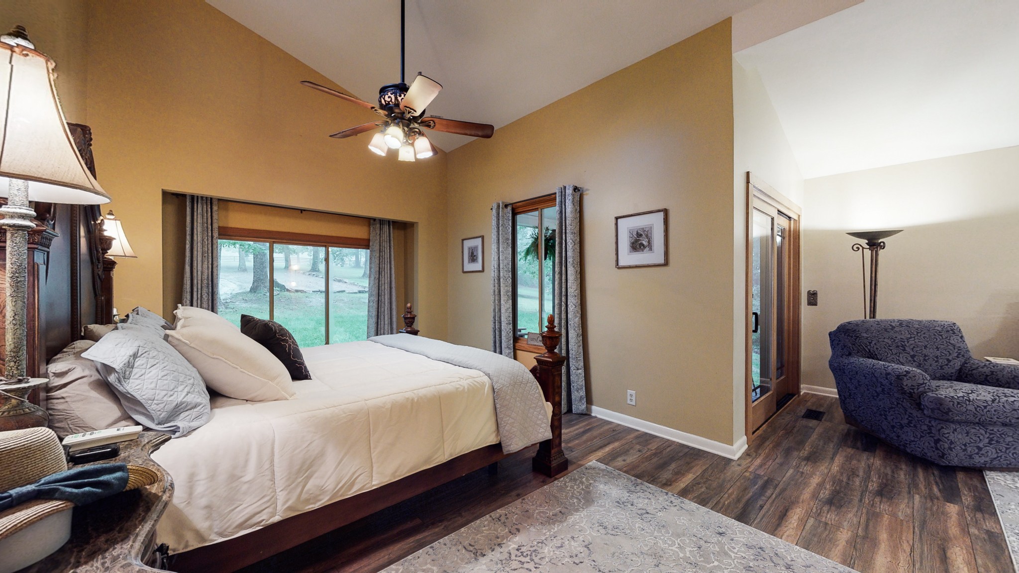 7449 Les Hughes Road Fairview, TN 37062 - Photo 25 of 49 a bedroom with a bed couch and a window