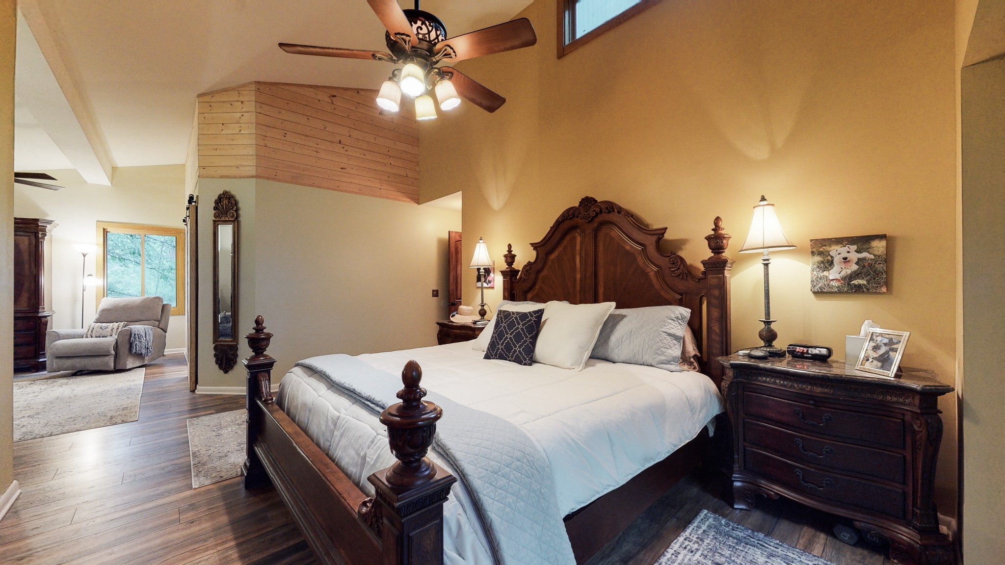 7449 Les Hughes Road Fairview, TN 37062 - Photo 26 of 49 a bedroom with a bed and wooden floor