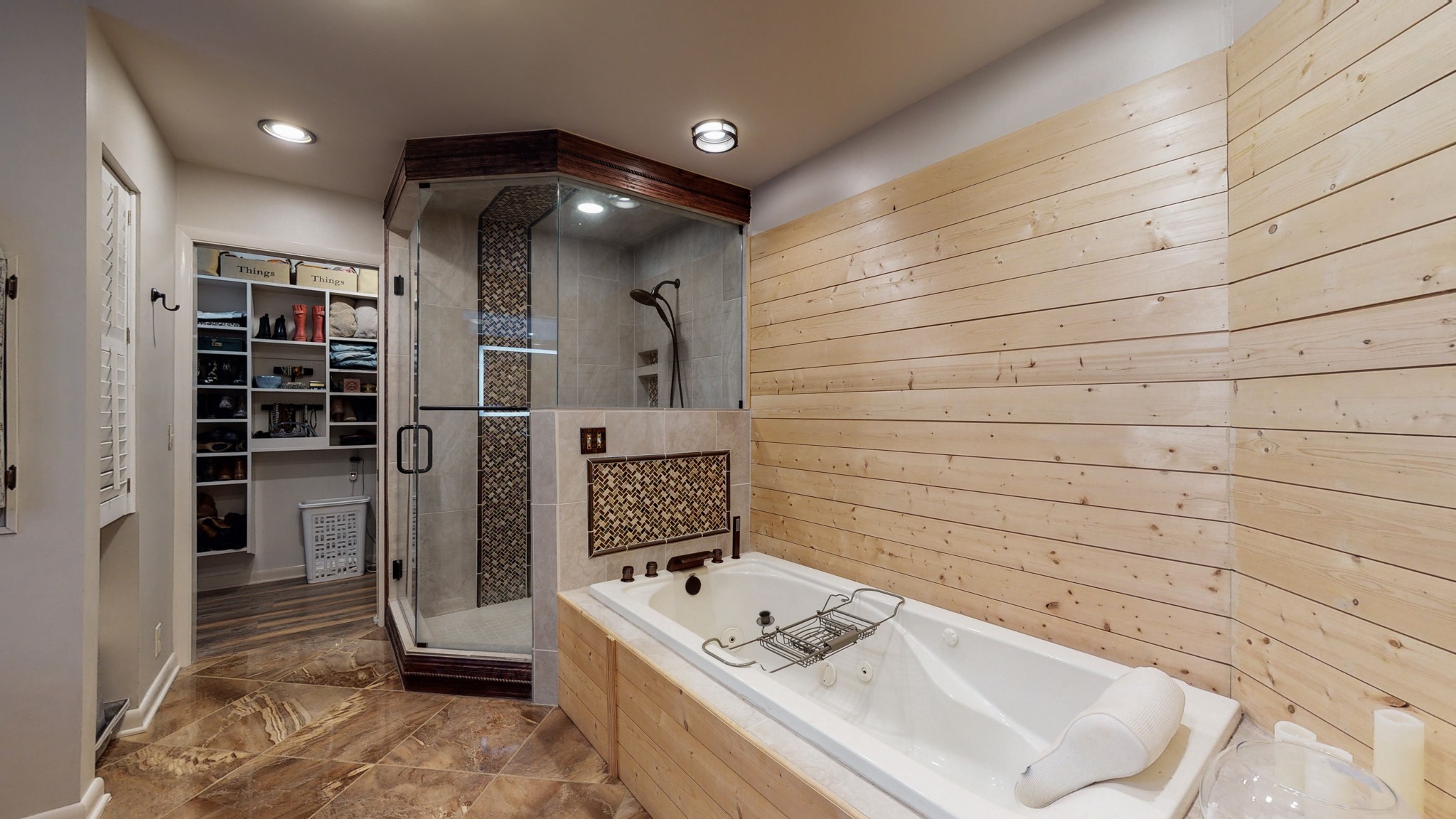 7449 Les Hughes Road Fairview, TN 37062 - Photo 29 of 49 a bathroom with a bathtub and a shower