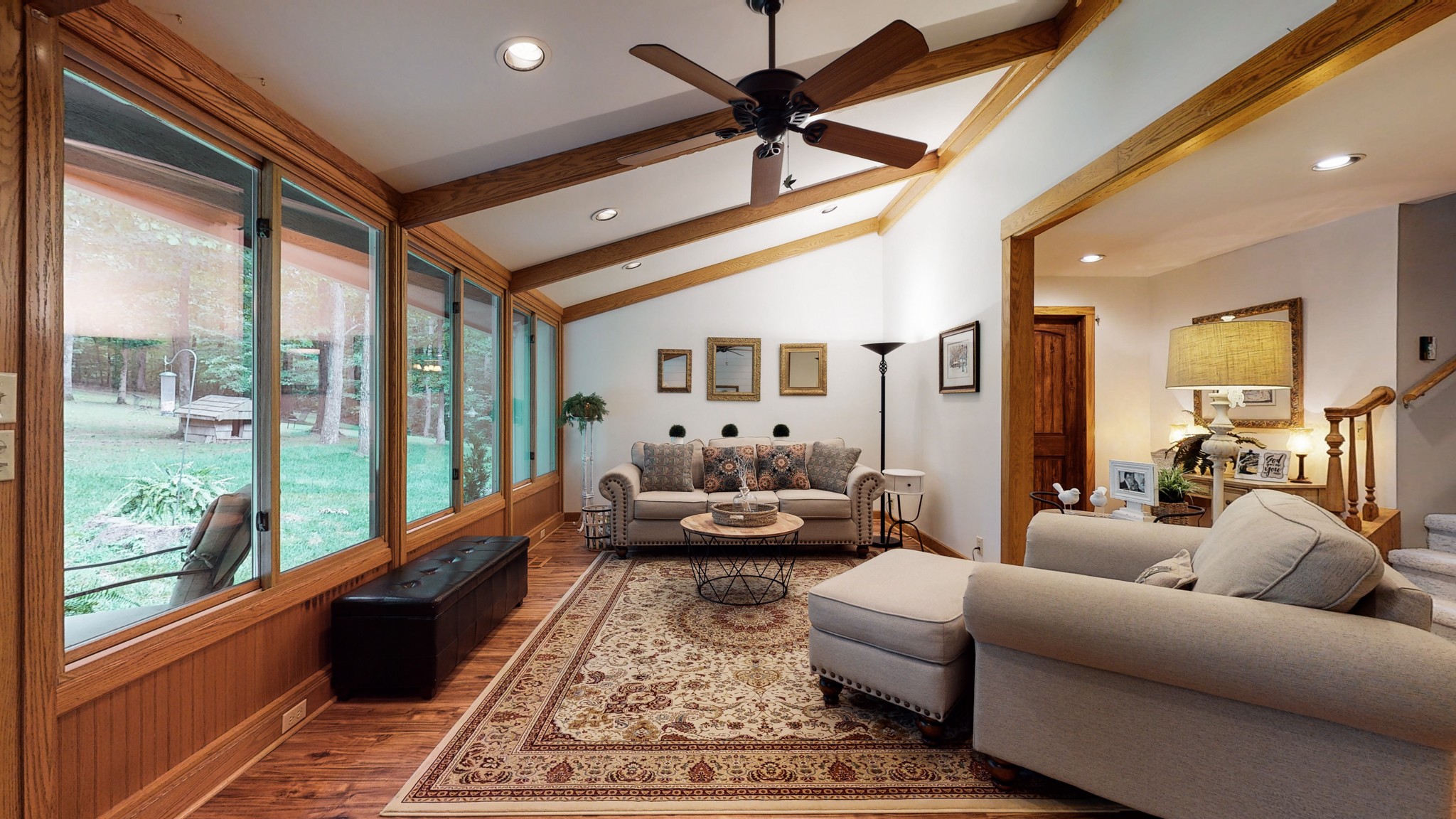 7449 Les Hughes Road Fairview, TN 37062 - Photo 4 of 49 a living room with furniture fireplace and a large window