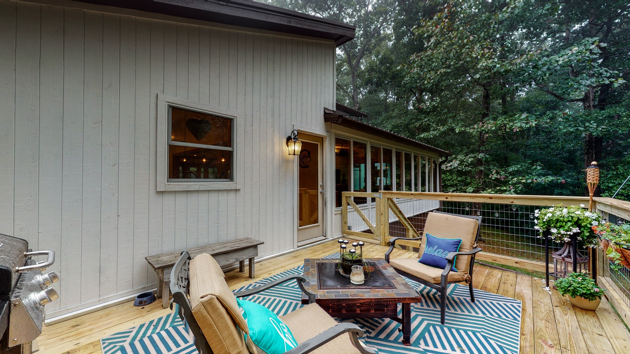 7449 Les Hughes Road Fairview, TN 37062 - Photo 39 of 49 a patio with hardwood table and chairs