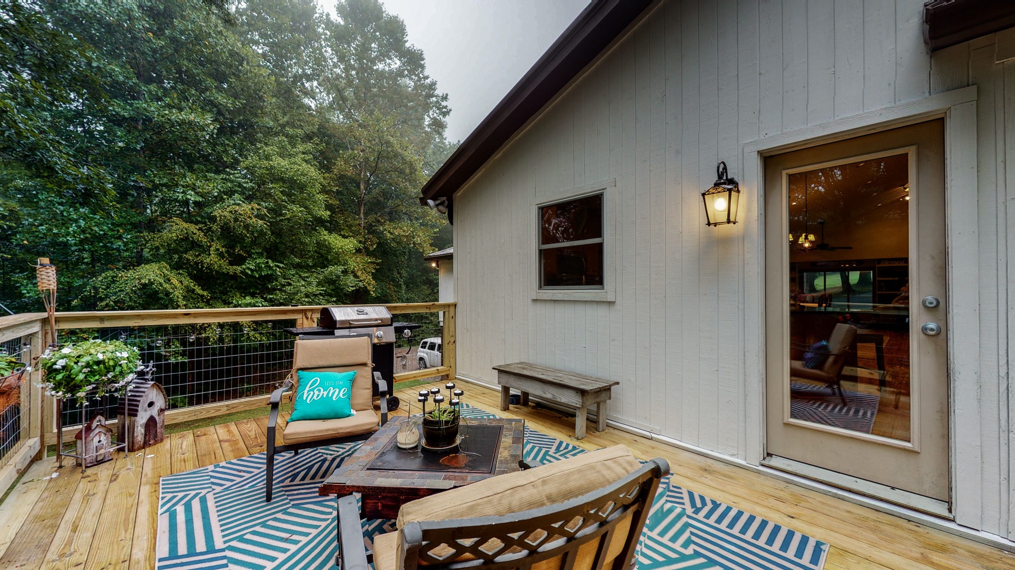 7449 Les Hughes Road Fairview, TN 37062 - Photo 40 of 49 a balcony with table and chairs