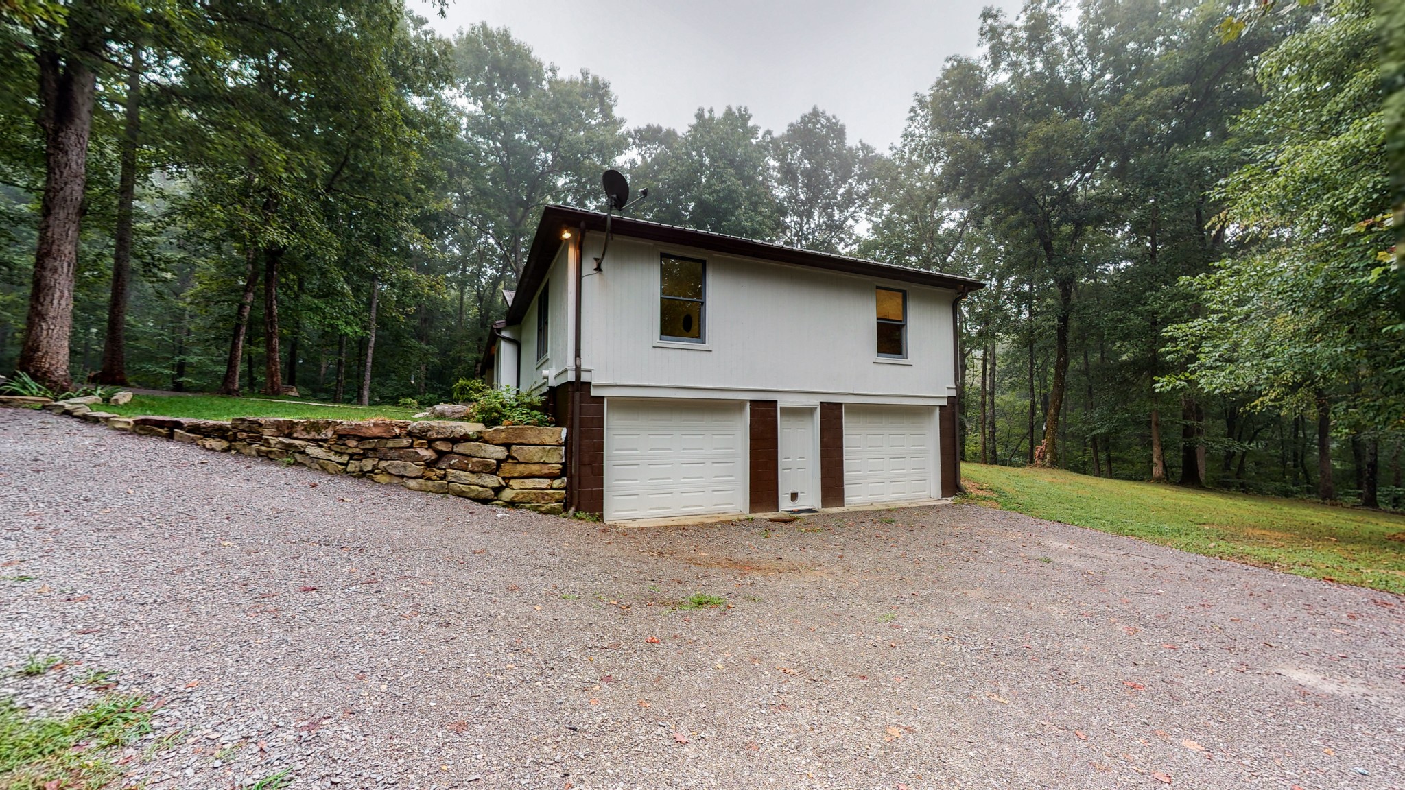 7449 Les Hughes Road Fairview, TN 37062 - Photo 44 of 49 a view of a house with a yard and large tree