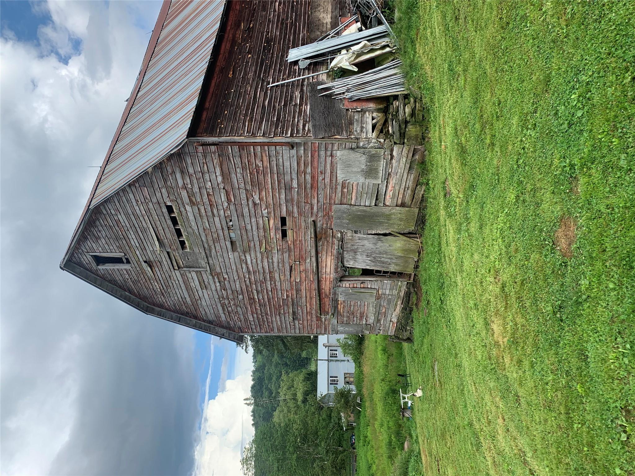 3 Burr Road Cochecton, NY 12726 - Photo 3 of 16 a view of a backyard of the house