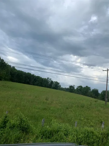 a view of yard with ocean