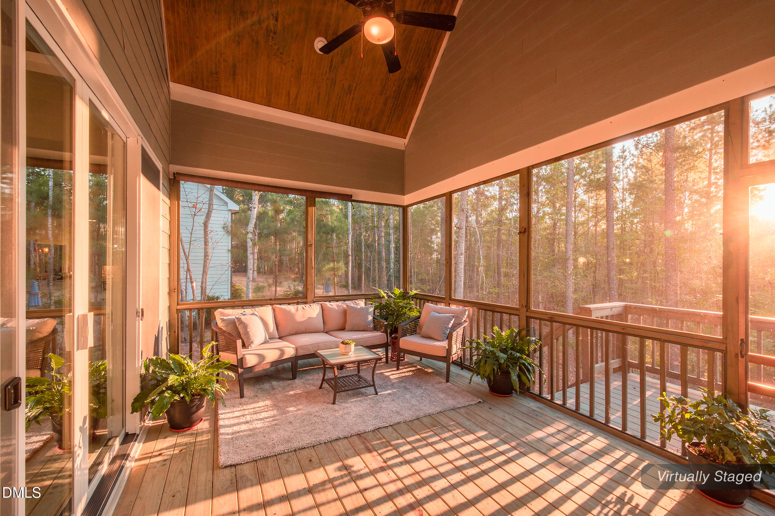 231 High Ridge Lane Pittsboro, NC 27312 - Photo 42 of 47 a living room with furniture and floor to ceiling windows