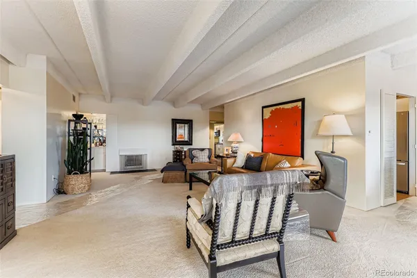 a kitchen with stainless steel appliances granite countertop a refrigerator a stove top oven a sink and dishwasher