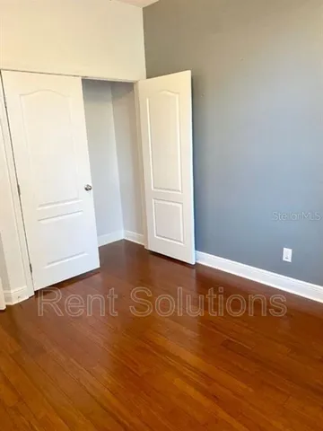 a bathroom with a granite countertop bathtub toilet and sink